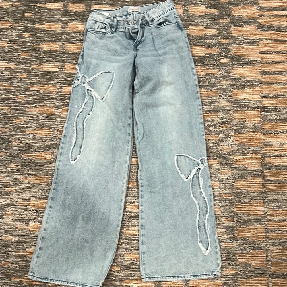 Women's Light Blue Jeans with Bow Detail